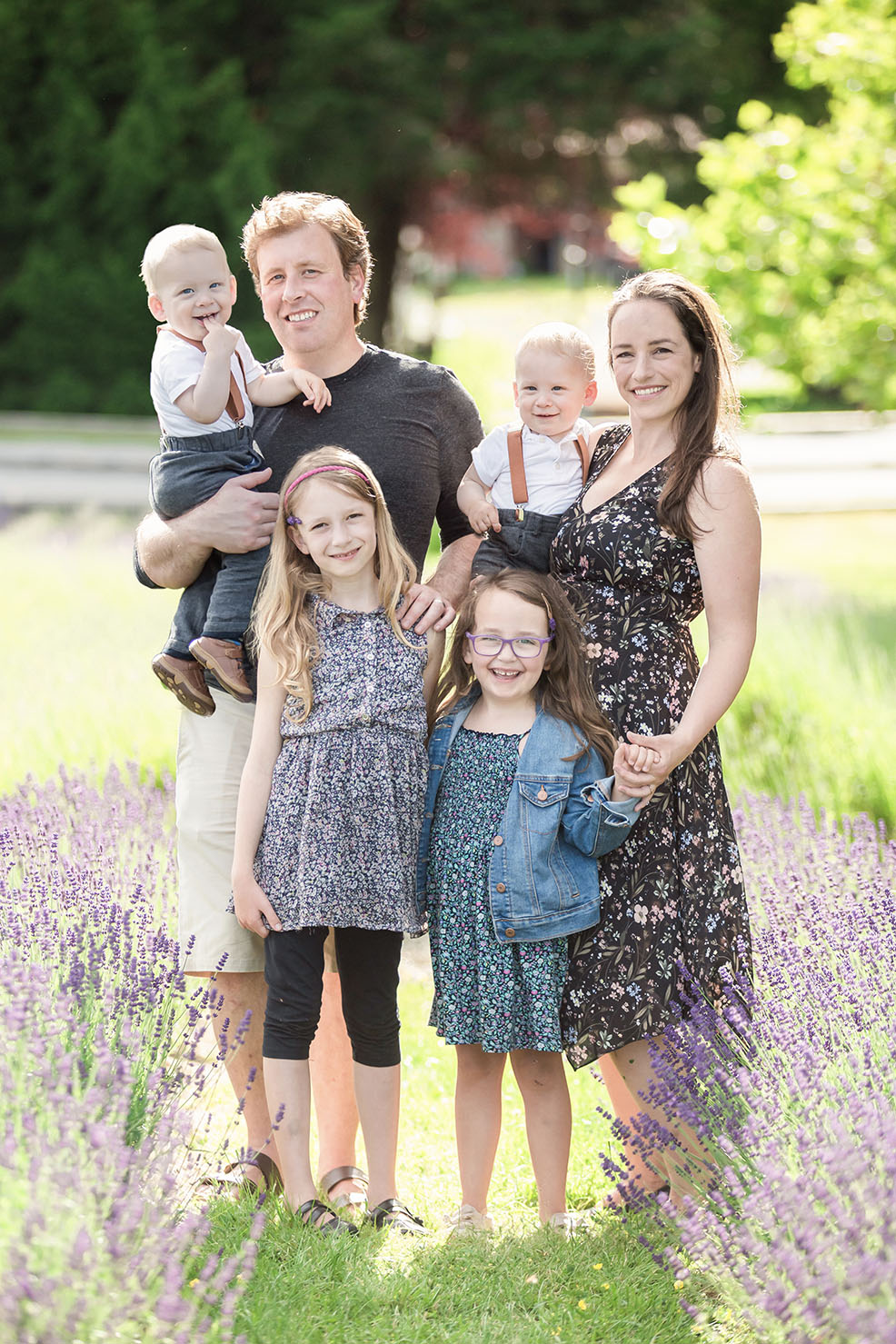 My Family Family of 6 standing in a garden